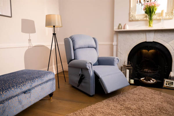 Small image of pale grey electric assisted reclining mobility armchair