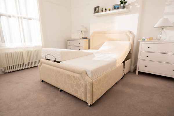 Double bed remote controlled adjustability
